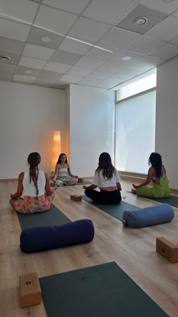 Susy leading an ArmoYoga meditation at Kamla Yoga